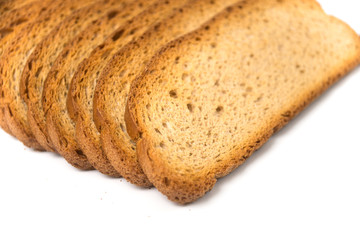 Closeup of organic crackers slices on white background