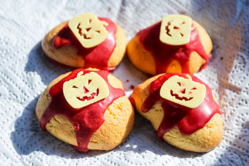 Cookies with ketchup and Halloween pumpkin shaped chips