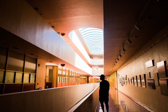 Silhouette Man Standing In Corridor Of Marin County Civic Center