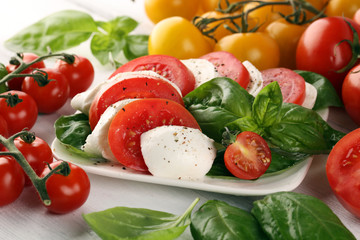 Mozzarella. Traditional italian food. White ball mozzarella buffalo Italian soft cheese with tomato and fresh basil