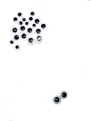 
google eyes on a white background, artificial plastic eyes for dolls, needlework on a white background
