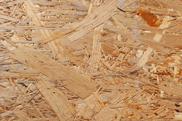Texture of OSB oriented chipboard. Material for the construction of frame houses