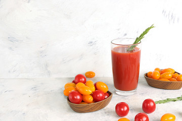 Tomato juice and ingredients on a concrete table. The concept of detox diet and weight loss, natural nutrition, healthy and natural foods. Summer drinks, vitamins C