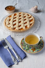 Afternoon tea break with jam tart