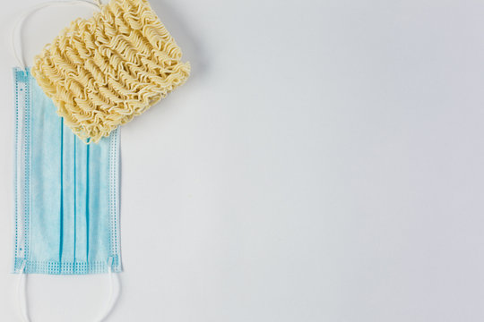 Novel coronavirus global epidemic, infectious respiratory illness spread and covid-19 pandemic concept the world map on surgical mask isolated.