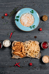 cream soup and french fries seton grey served table. traditional dish menu served in a restaurant. top view