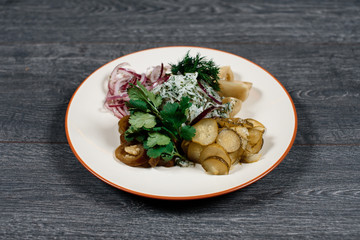 pickles and marinated set on grey served table. traditional dish menu served in a restaurant