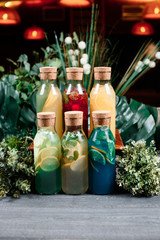 Assortie of juice in glass bottles
