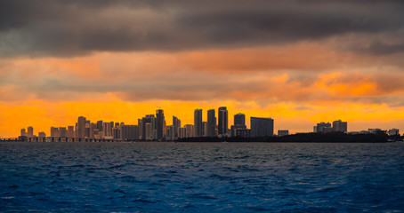 sunset cloudy clouds city buildings skyscraper cityscape aquatic silhouette bridge sunrise skyline architecture miami florida dusk panorama impressions orange blue sea  © Alberto GV PHOTOGRAP