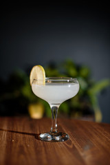 Marguerita cocktail is on the bar. Space for text. Photo for the menu.