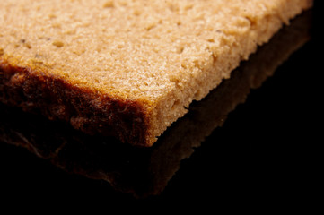Macro close up of slice of dark bread