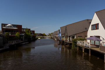 Residential buildings in a peaceful neighboorhood, on the shore of a canal