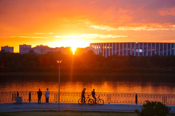 Bicyclists at Volga river embankment, Nizhny Novgorod, Russia