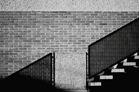 Staircase Against Wall On Sunny Day