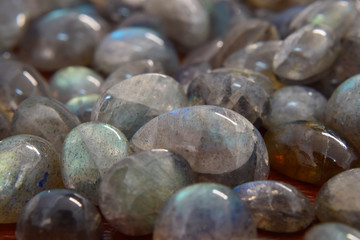 Beautiful and rare labradorite
Lay on the ground