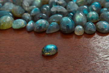 Beautiful and rare labradorite
Lay on the ground