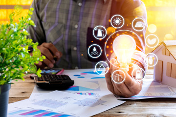 Businessmen calculate electricity bills