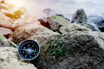 compass on the bank with sunflare