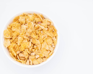 cereal in a white bowl on white background. Healthy breakfast concept.