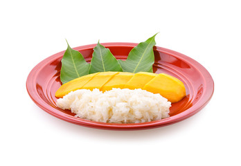 Mango Sticky Rice in red plate on white background