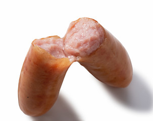 Cross section of sausage placed on a white background