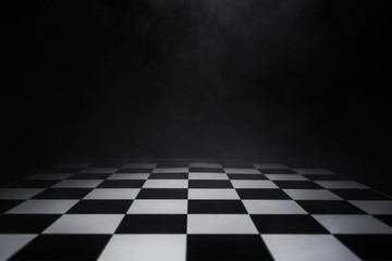 empty chess board with smoke float up on dark background - Powered by Adobe