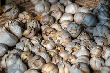 Dry garlic for sale at street food market in Vietnam. Close up