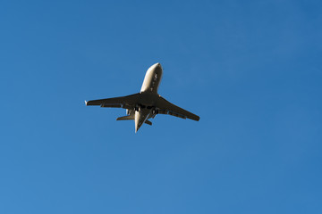 Airplane in the blue sky