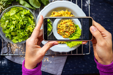 Phone food photo. Smartphone photography of millet porridge with vegetables. Create and make...