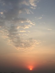 beautiful scenario of the early sunrise with attractive clouds