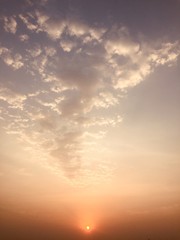 A BEAUTIFUL EVENING SKY WITH BRIGHT AND CHARMING CLOUDS IN THE SKY