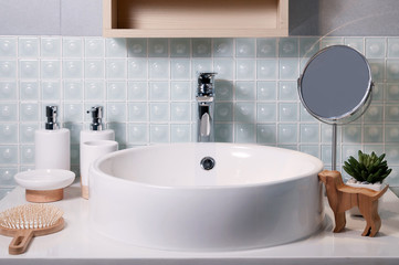 Bathroom interior with sink and faucet.