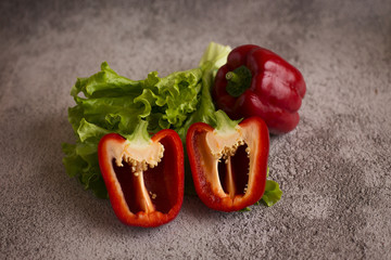  Red pepper lies on a white background
