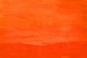 Abstract hand-painted orange background. Abstract red-yellow backgound texture. Gouache painted paper