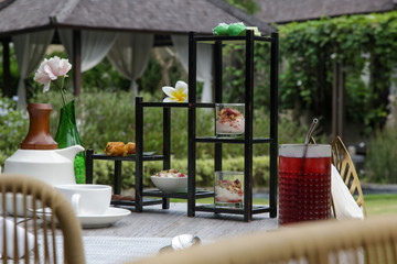 Fototapeta na wymiar Traditional afternoon tea setup in the garden