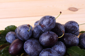 Plums on table