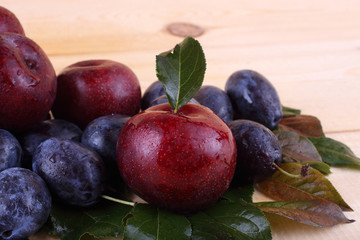 Plums on table