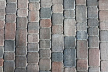 masonry wall paving stones as a background close up