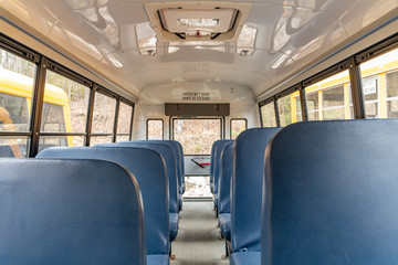 Inside a mini school bus rear view landscape
