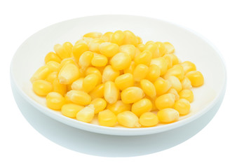 Boiled corn seeds in white plate isolated on white background.