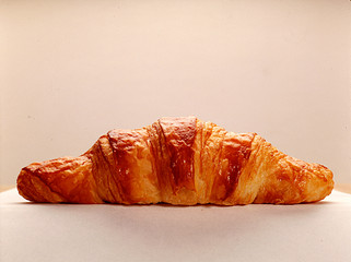 fresh croissant on a white background
