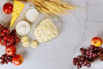 Fresh dairy products milk, cottage cheese, fruit for shavuot.