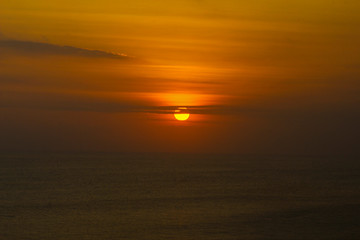 Sunset Sunrise scene above ocean in Bali Indonesia