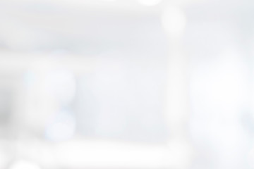 Abstract white blurred background bright light bokeh, interior modern hospital room