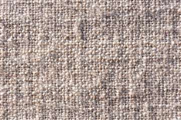 The texture of the plaid is light beige