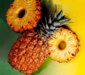 ripe pineapple on a wooden table