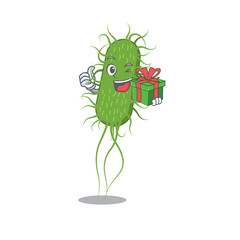 Smiling e.coli bacteria cartoon character having a green gift box