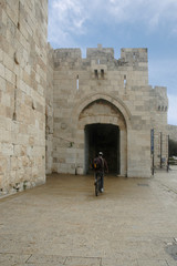 Bicyclist Entering Jaffa Gate, Jerusalem