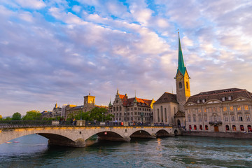 Fototapeta na wymiar Panoramic view of Zurich city with famous Fraumunster Church and bridge.