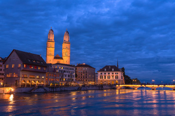 Dramatic night view of Zurich with gross muenster.